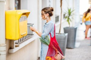 woman at mailbox
